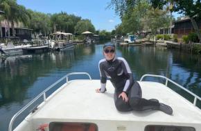 Madison Trowbridge sitting on a boat